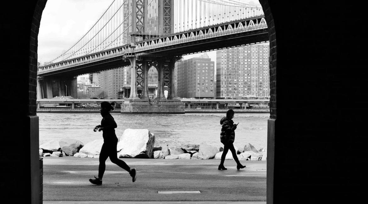 Running across from the Brooklyn Bridge