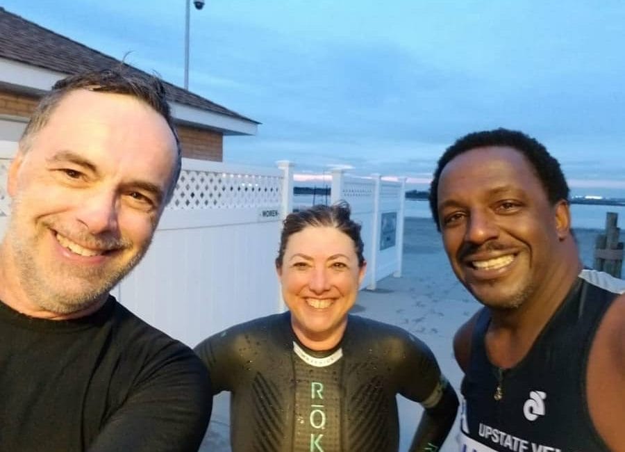 Ray, Hilary and Nigel finish a swim