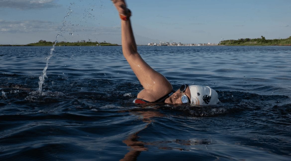 Hilary topper swimming in open water