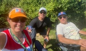 Hilary, Jon, Bill watching cyclists 