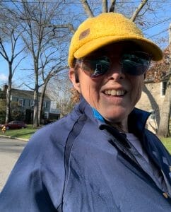 Hilary Topper wearing Headsweats yellow sherpa hat