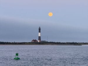moon over lighthouse 